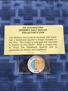 lot 18 image: 2000 interesting Kennedy Half Dollar collector item - statehood image imposed on the face of coin