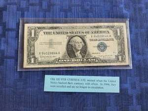 lot 24 image: 1957 B Silver Certificate 1 dollar note - no longer in circulation