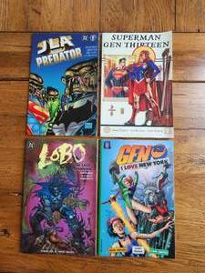 lot 49 image: Selection of 4 trade paperback comics - N.O.S