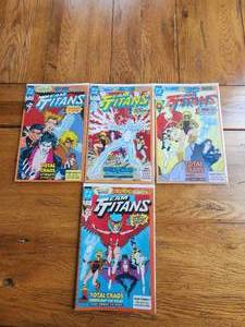 lot 61 image: DC Comics - Team Titans - #1 - 4 of the 5 #1 variant covers - 1992
