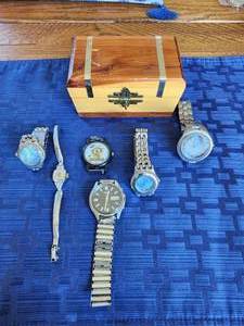lot 240 image: Small cedar chest with various watches