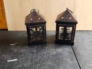 lot 225 image: Pair of metal winter themed lanterns