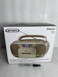 lot 81 image: New Jensen Portable Bluetooth CDMP3 Player With Cassette PlayerRecorder, Bronze - As Shown