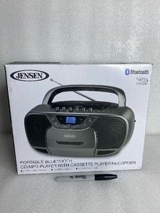 lot 82 image: New Jensen Portable Bluetooth CDMP3 Player With Cassette PlayerRecorder, Black - As Shown