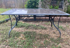 lot 262 image: Glass Outdoor Patio Table Approx. Item Dimensions (66 L x 38 14 W x 28 H) - In Condition As Shown