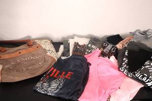 lot 99 image: New Tshirts and used canvas bag (zipper is stuck)