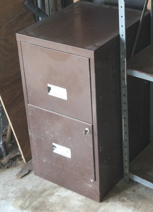 lot 1 image: two drawer cabinet filled with contents