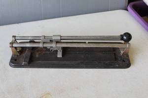 lot 41 image: manual tile cutter, specifically a QEP 12 inch professional tile cutter.