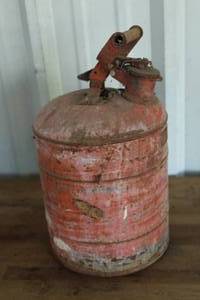 lot 81 image: vintage Justrite metal safety gas can