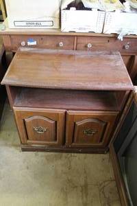 lot 85 image: rustic wooden TV stand with two storage doors