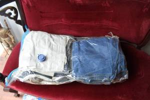 lot 114 image: Bag full of mens pants