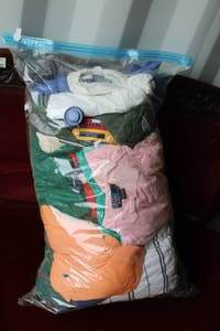 lot 115 image: Bag full of mens tops a mix of brands and XL to XXL