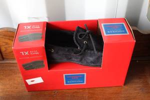 lot 117 image: XL pair of Dockers black moccasin slippers for men