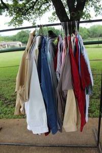 lot 130 image: Mixed brands and styles of mens tops ranging in sizes XL to XXL