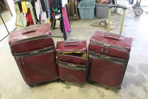 lot 66 image: Samantha Brown burgundy faux-croco embossed luggage sets, often sold on HSN as part of various multi-piece collections