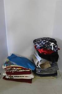 lot 141 image: Bag full of clothes ranging in sizes XL to XXL sizes around 44 on bottoms