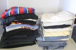 lot 143 image: Bag full of clothes ranging in sizes XL to XXL bottoms around 44