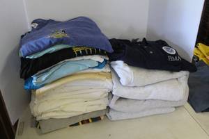 lot 144 image: Bag full of clothes ranging in sizes XL to XXL