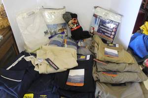 lot 145 image: Bag full of clothes all with tags