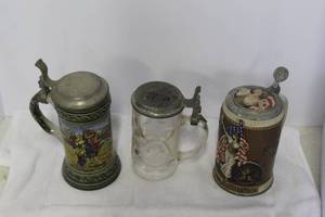 lot 172 image: vintage German beer steins featuring pewter lids