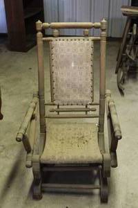 lot 216 image: This antique platform rocking chair