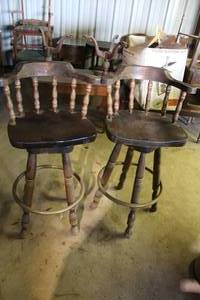 lot 244 image: vintage wooden bar stool features a classic spindle-back design and a swivel seats