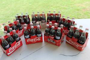 lot 270 image: Collectible Coke bottles and collector Dr pepper bottle