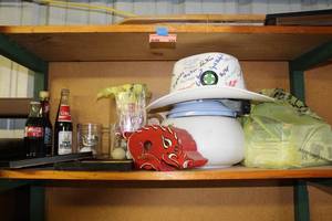 lot 326 image: Shelf full of things left over from the last sale