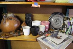 lot 327 image: Shelf full of things left over from the last sale