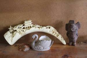 lot 339 image: carved bone or faux-ivory item and swan figurine and more see pictures