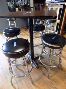 lot 15 image: Bistro height table square with 4 barstools round