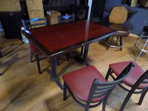 Rectangle table with 4 dining chairs metal frames and red seats
