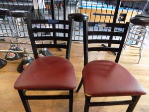 lot 50 image: Black metal frame chair red seat  some small tears x 2