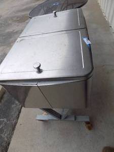 lot 27 image: Stainless steel rolling patio cooler double fold back lids note, has some  bumps and bruises but still functional