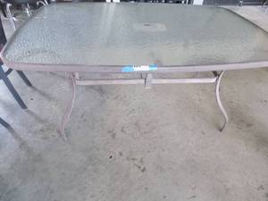 lot 58 image: Glass top patio table rectangle