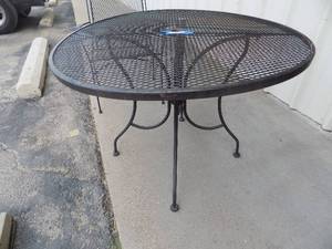 lot 78 image: Black round patio table metal mesh top
