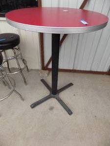 lot 81 image: Bar height round table with red top