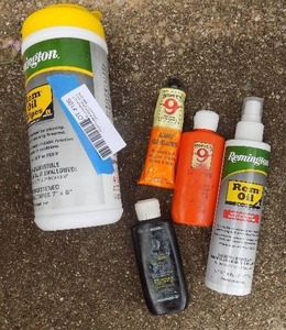 lot 106 image: Remington REM oil, gun grease, Hoppes oil plus