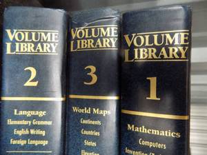 lot 112 image: 3 volume set of books volume library Math language, and world maps