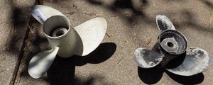 lot 179 image: boat props Johnson PJ0  and 1 unmarked