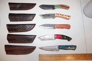 lot 13 image: Damascus steel NEW knives (5 times the money)