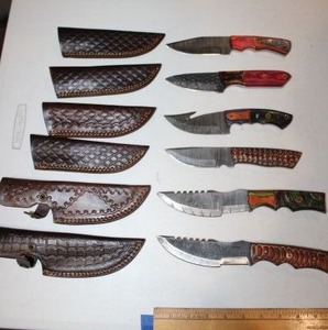 lot 15 image: Damascus steel NEW knives (6 times the money)
