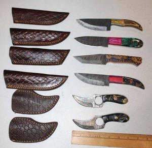 lot 16 image: Damascus steel NEW knives (6 times the money)
