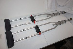 lot 44 image: Adjustable crutches