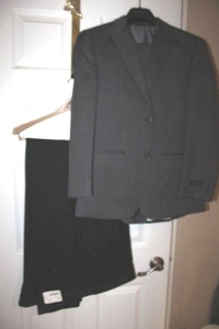 lot 53 image: Mens suit 36short x 30W  and pants 48 R