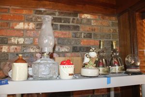 lot 95 image: Home dcor with hurricane lamp