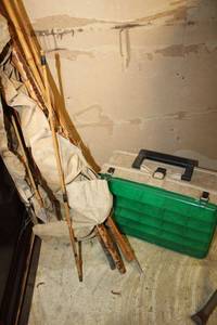 lot 69 image: Bamboo fishing poles with tackle box