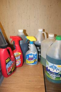 lot 145 image: Windshield washer fluids, and household cleaners