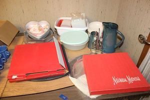 lot 146 image: Kitchen items serving platters, cake molds, pottery vases, and more