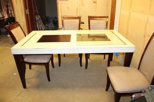 lot 71 image: Dining table with 4 chairs (missing one glass panel for table)